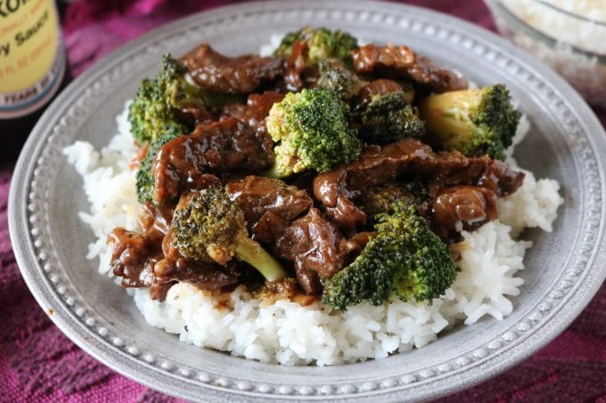 Homemade beef and broccoli served on top of white rice. 