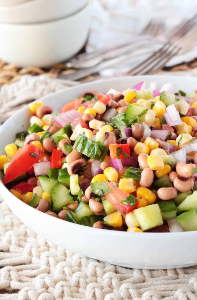 Black Eyed Pea Salad served in a white bowl. 