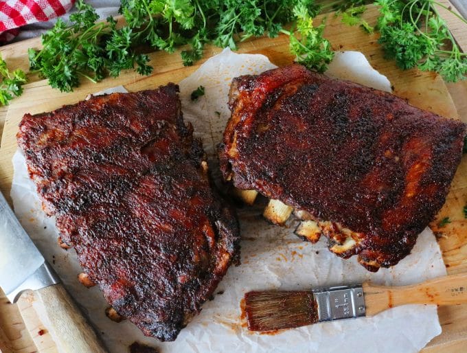 An overhead shot of Slow Cooker Spare Ribs on a cutting board. 