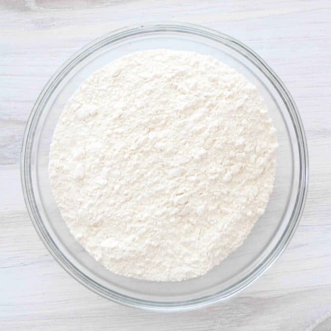 An overhead shot of a bowl of flour. 