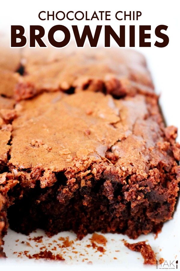 Image for Pinterest. Close up shot of a chocolate chip brownie in a baking dish.
