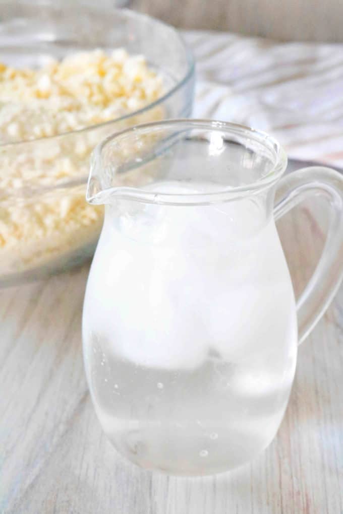 A pitcher of ice water.