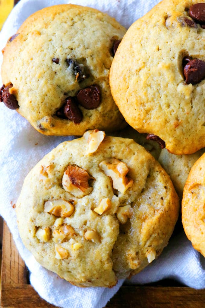 A mix of walnut and chocolate chip banana cookies in basket.