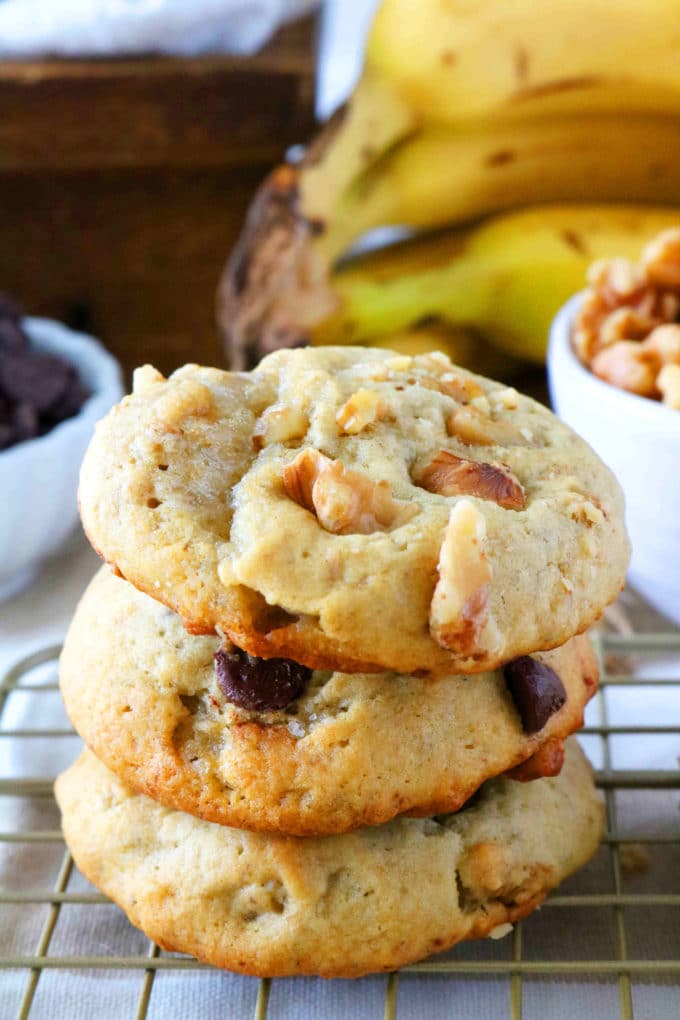 A stack of banana cookies on a cooling rack.