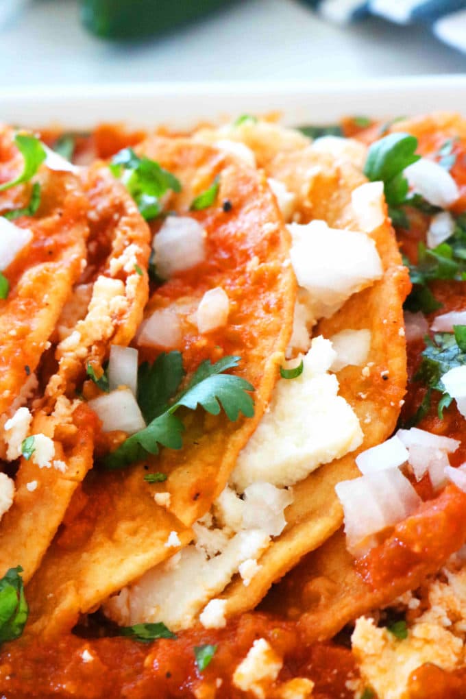 A close up shot of the cheese inside of entomatadas.