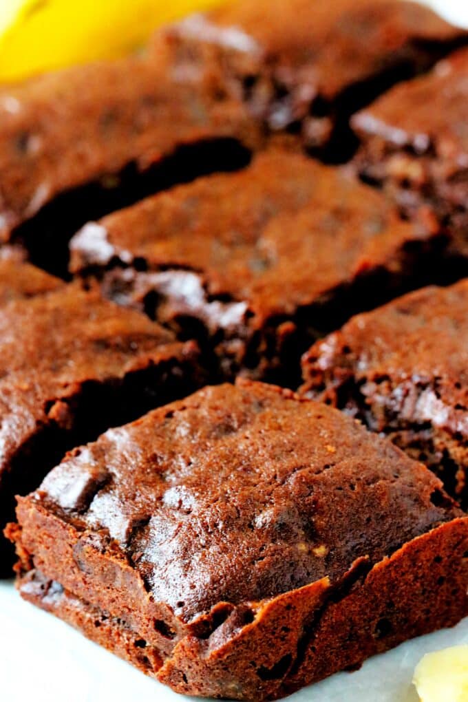 Close up shot of a corner piece of banana brownie squares.