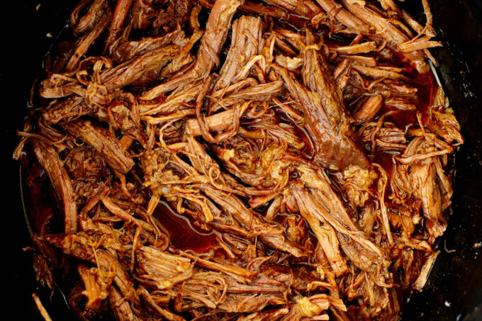 shredded beef in a juices