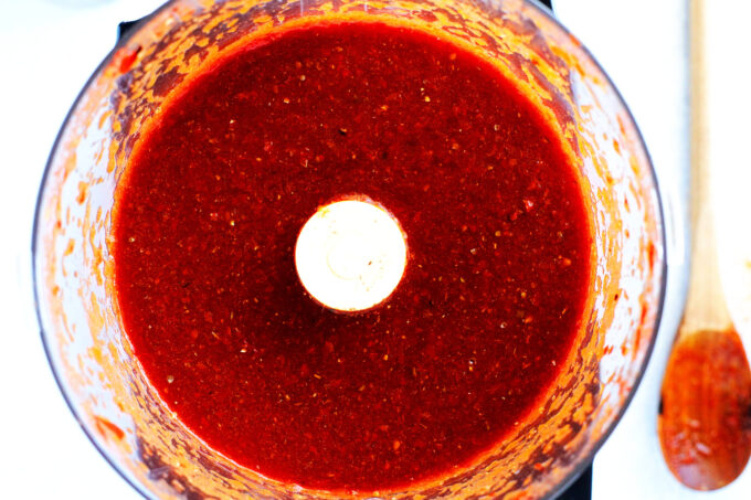 overhead view of guajillo sauce in a food processor