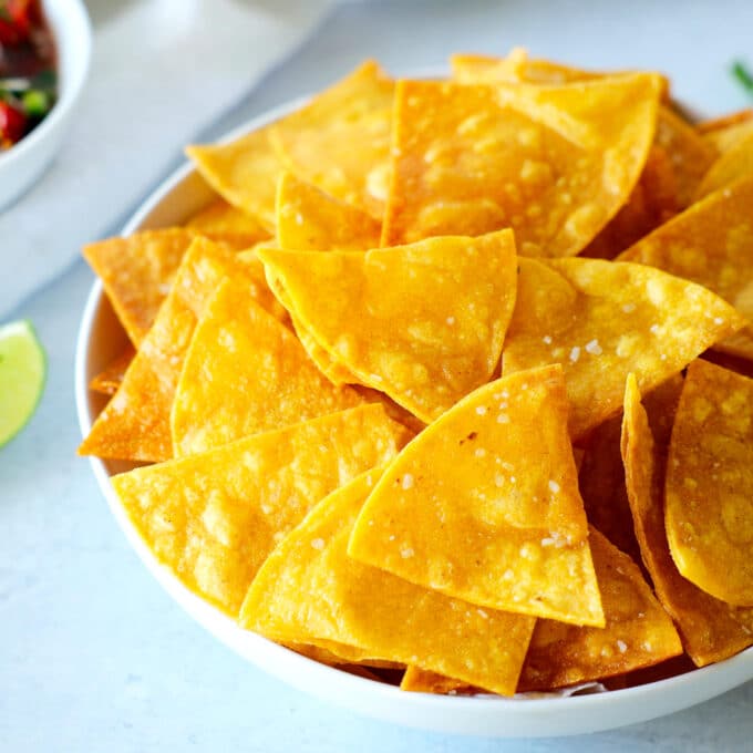 A close up of a bowl of tortilla chips
