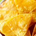close up of fresh, homemade tortilla chips, salted and crispy
