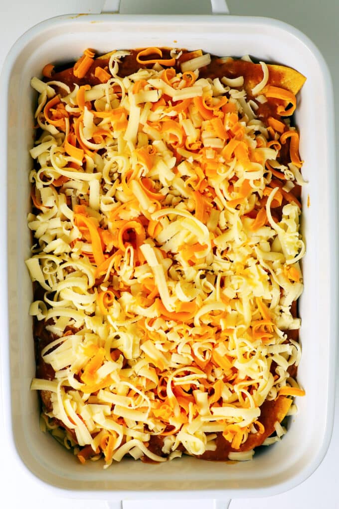 an overhead view of the casserole before going into the oven. cheese is the last thing added.