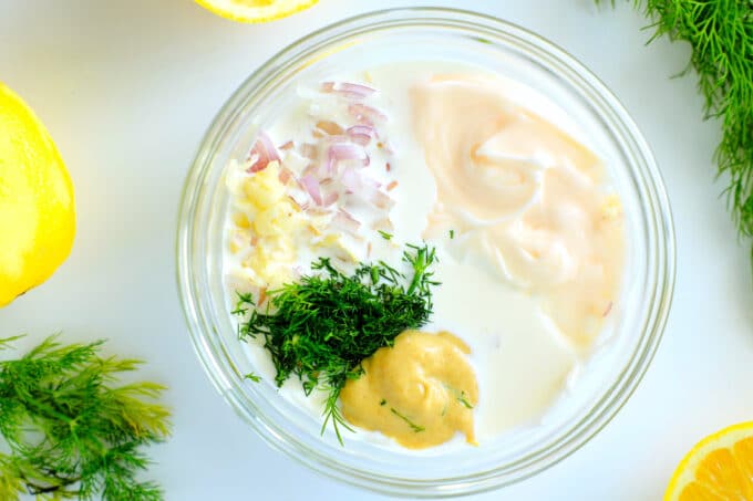 An overhead view of Dill sauce ingredients in a bowl, not yet mixed