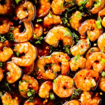 An overhead look at the Honey Garlic Shrimp still in the skillet, with lots of sauce.