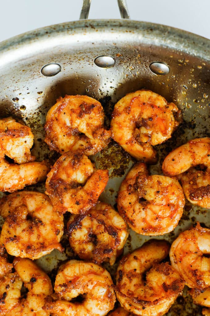 An overhead look at the shrimp being pan-seared.