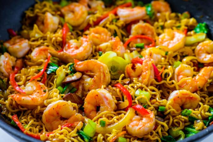 A wide shot of Shrimp Chow Mein completely assembled in the pan.
