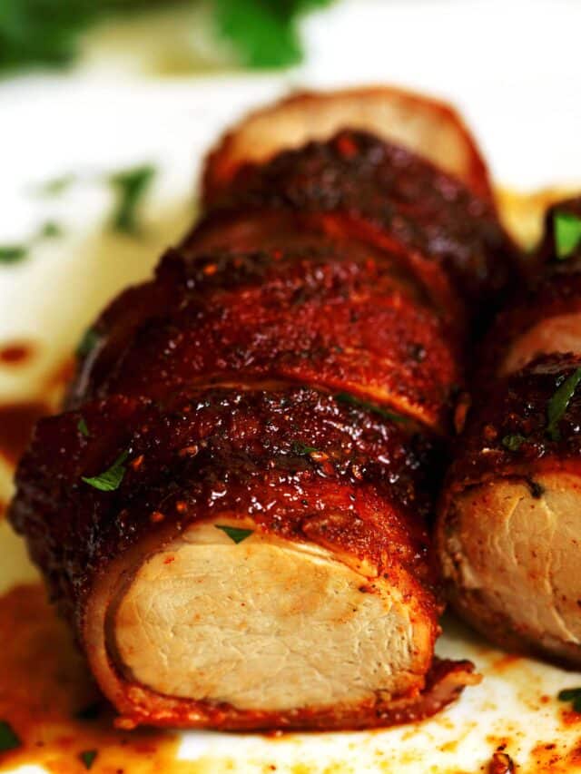 Bacon Wrapped Pork that has been cut into medallions.