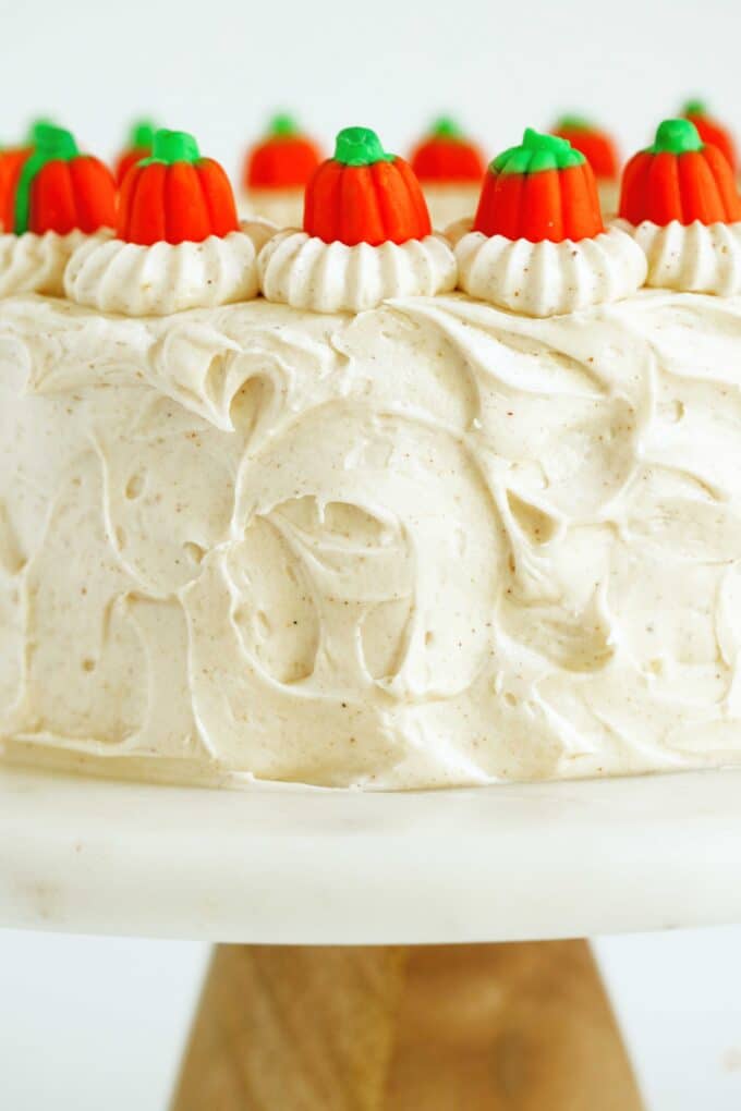Pumpkin Cake with Cream Cheese icing topped with candy pumpkins