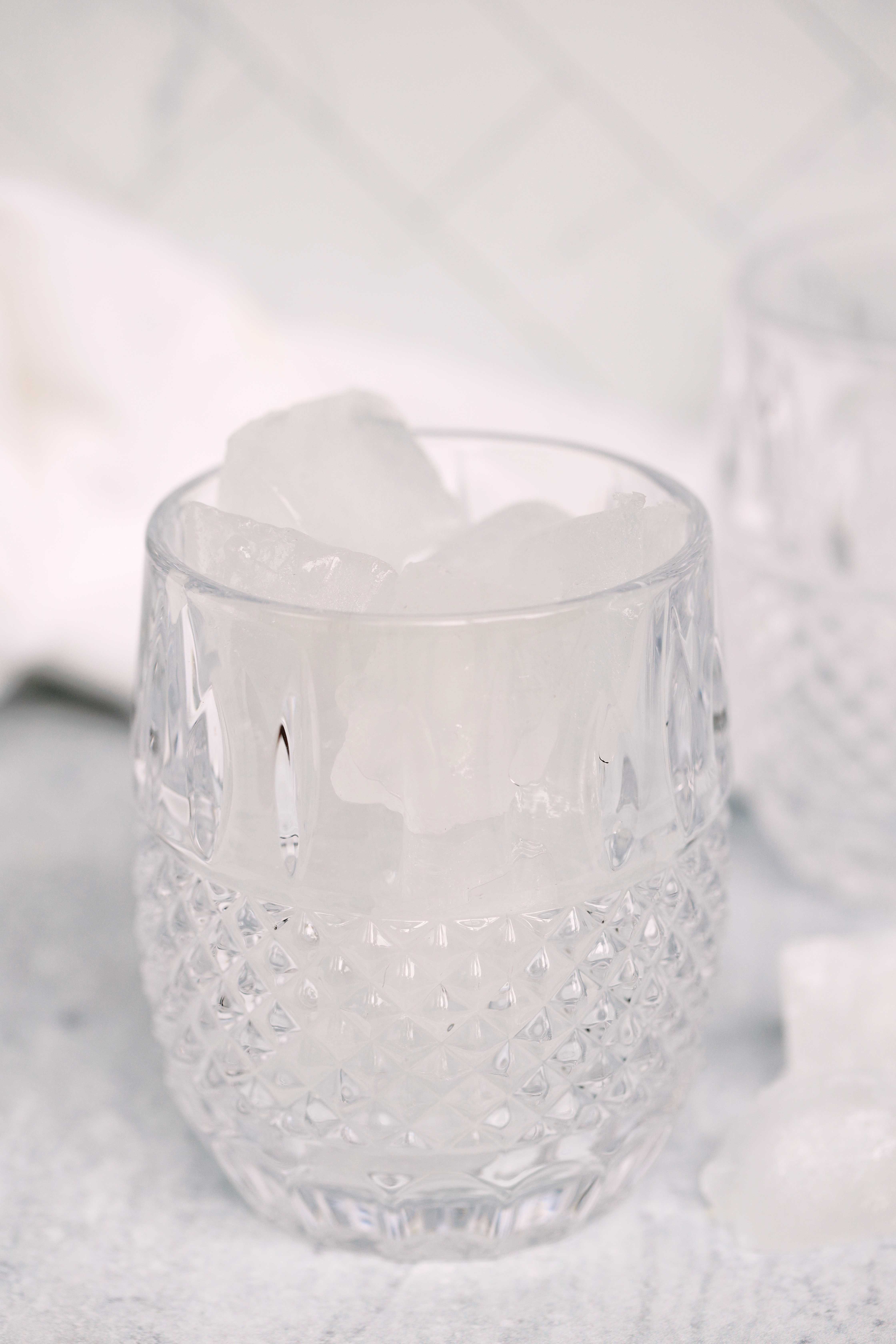 Cubes of ice in a rocks glass