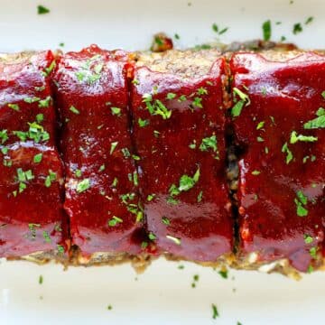 Meatloaf topped with fresh herbs