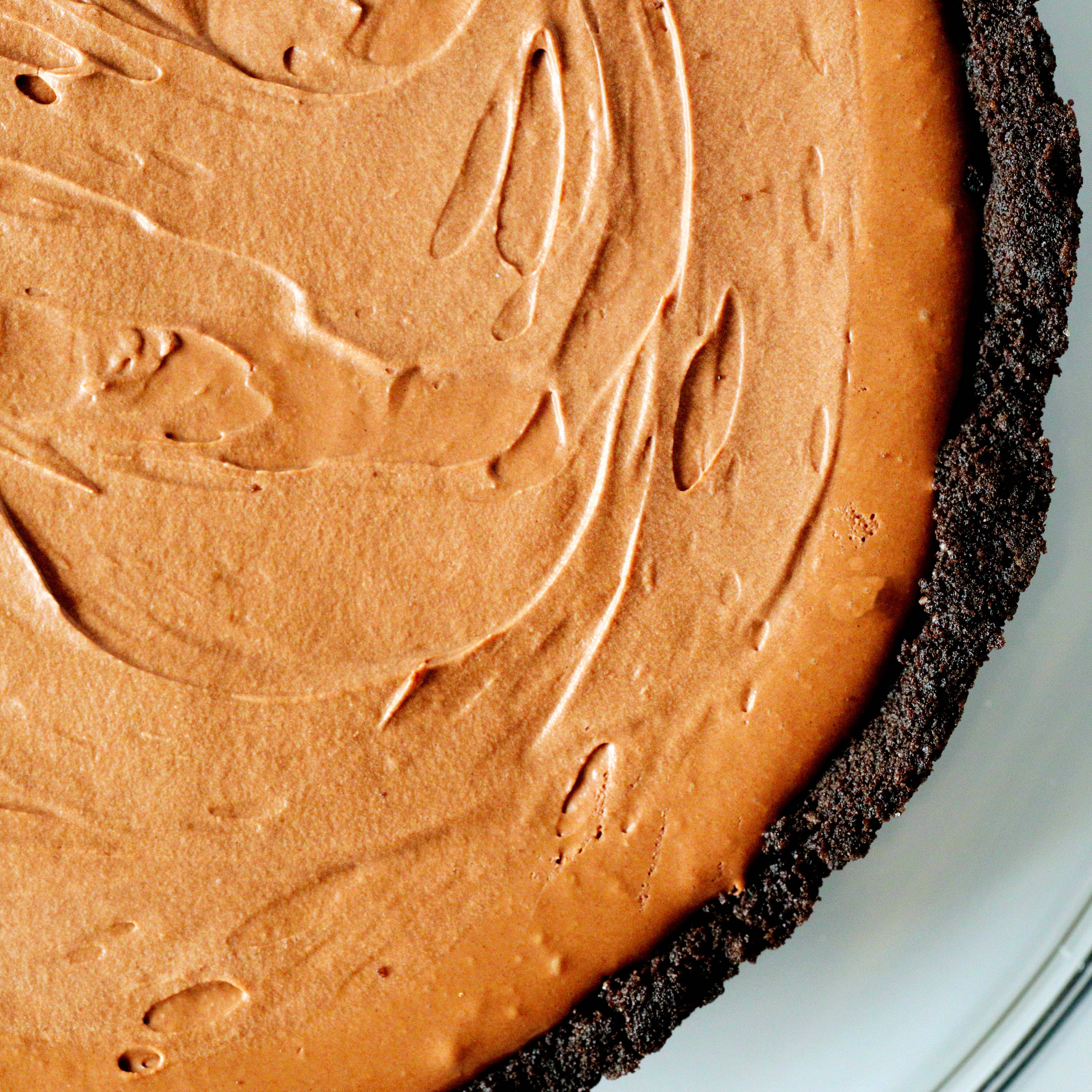 Closeup of Oreo pie crust with chocolate pudding pie center