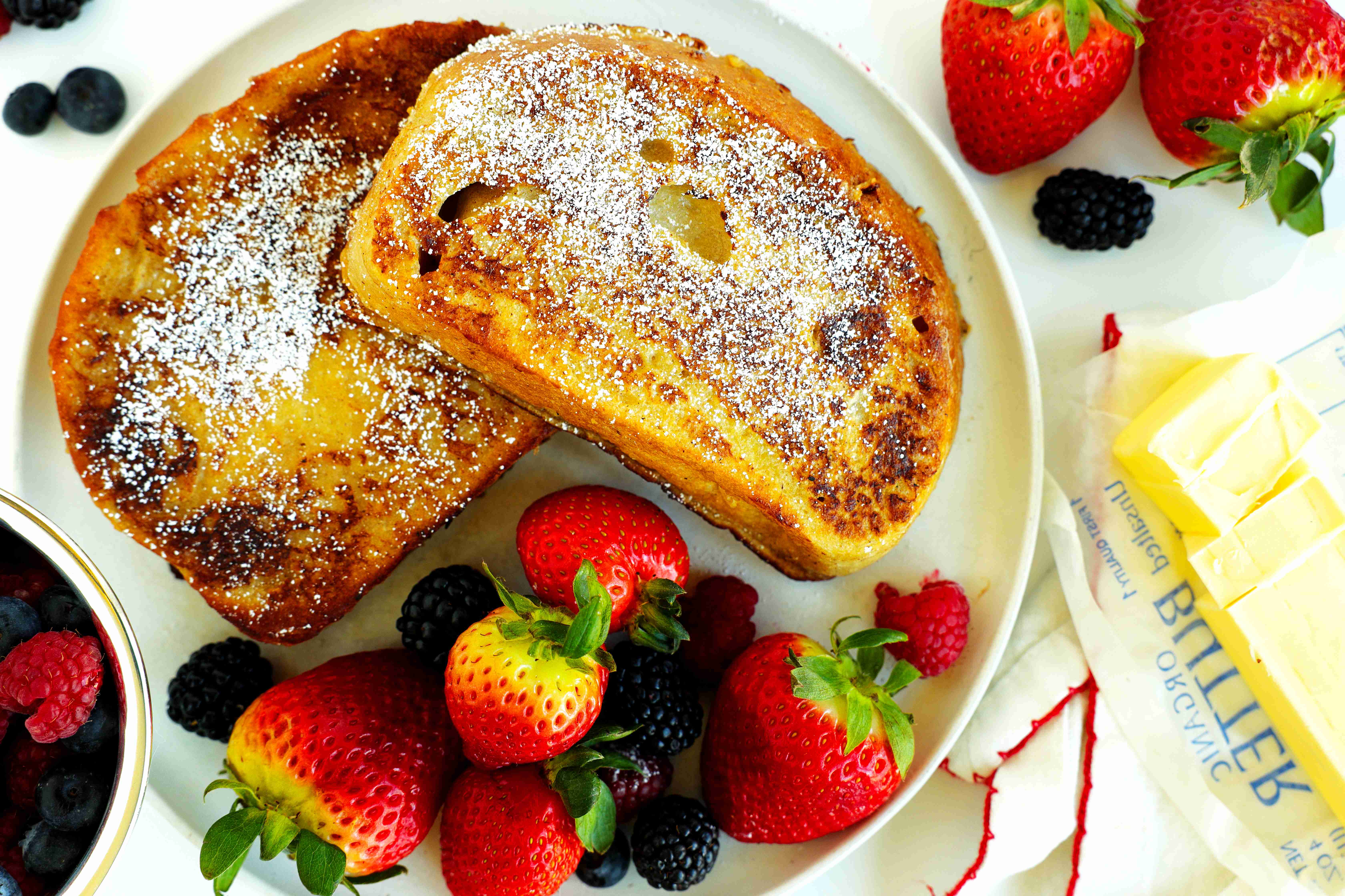 Overhead view of Sourdough French toast with fresh berries