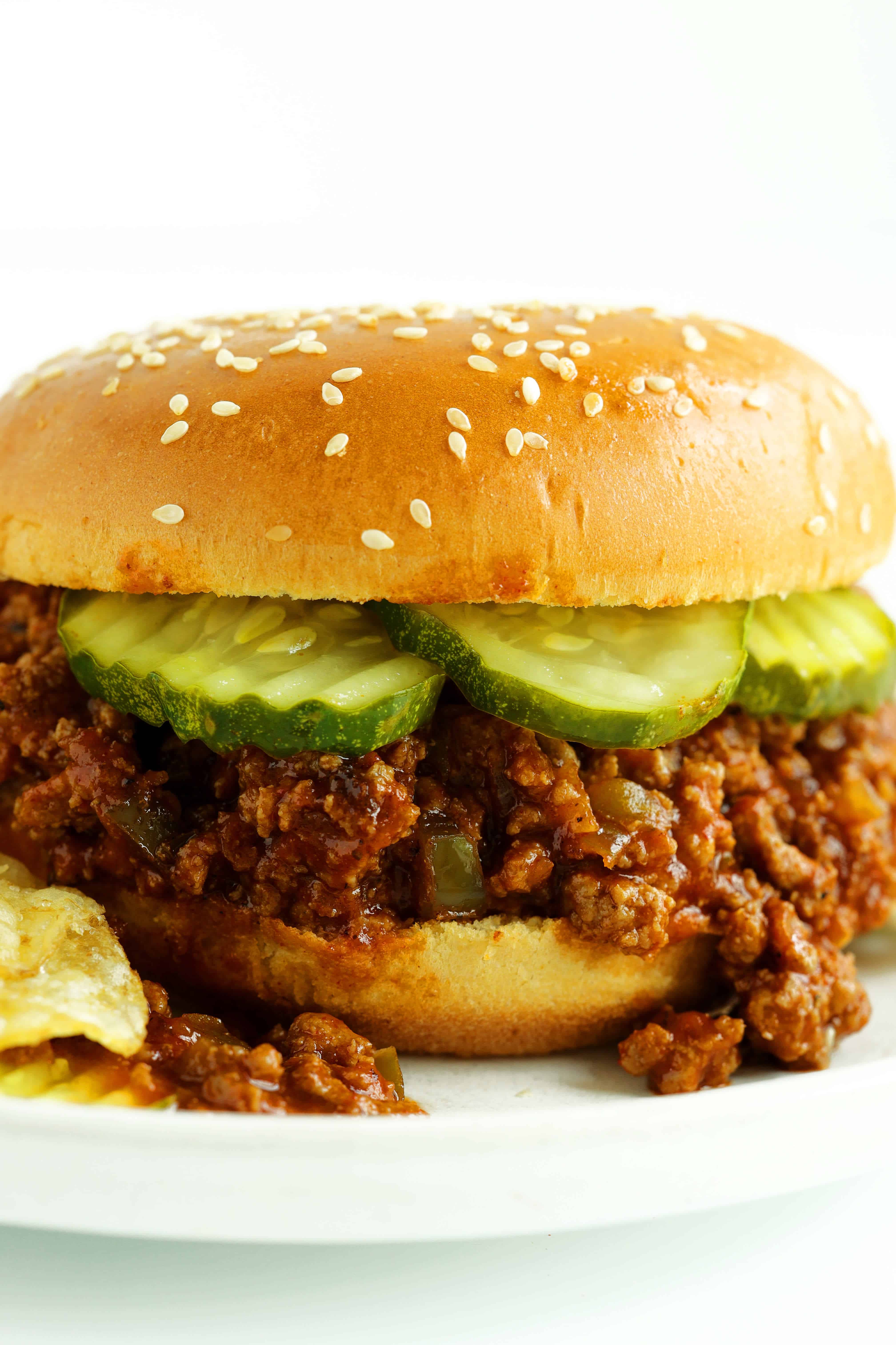 Turkey Sloppy Joe with potato chips and sliced pickles