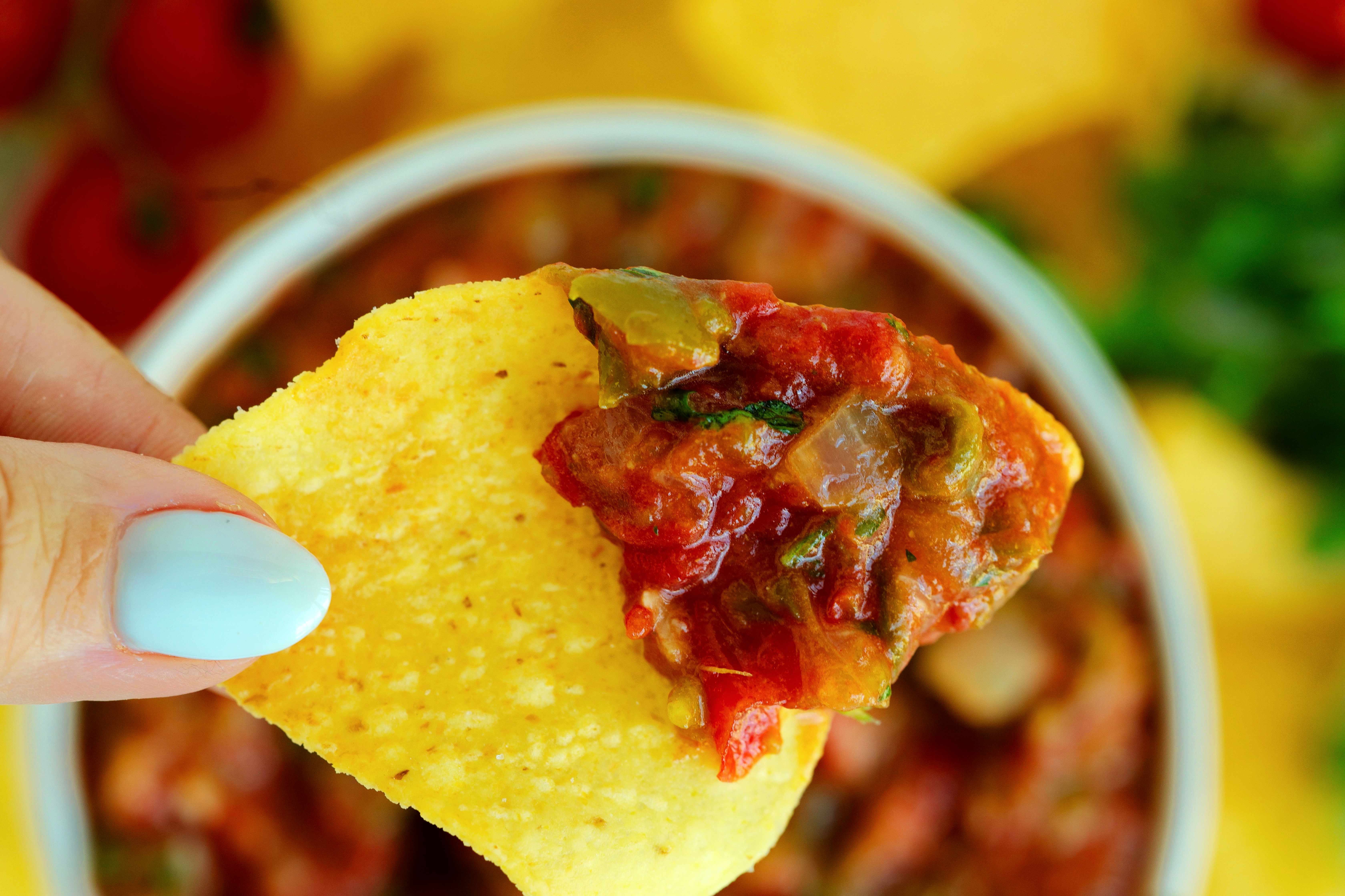 Closeup of Salsa Ranchera on a tortilla chip