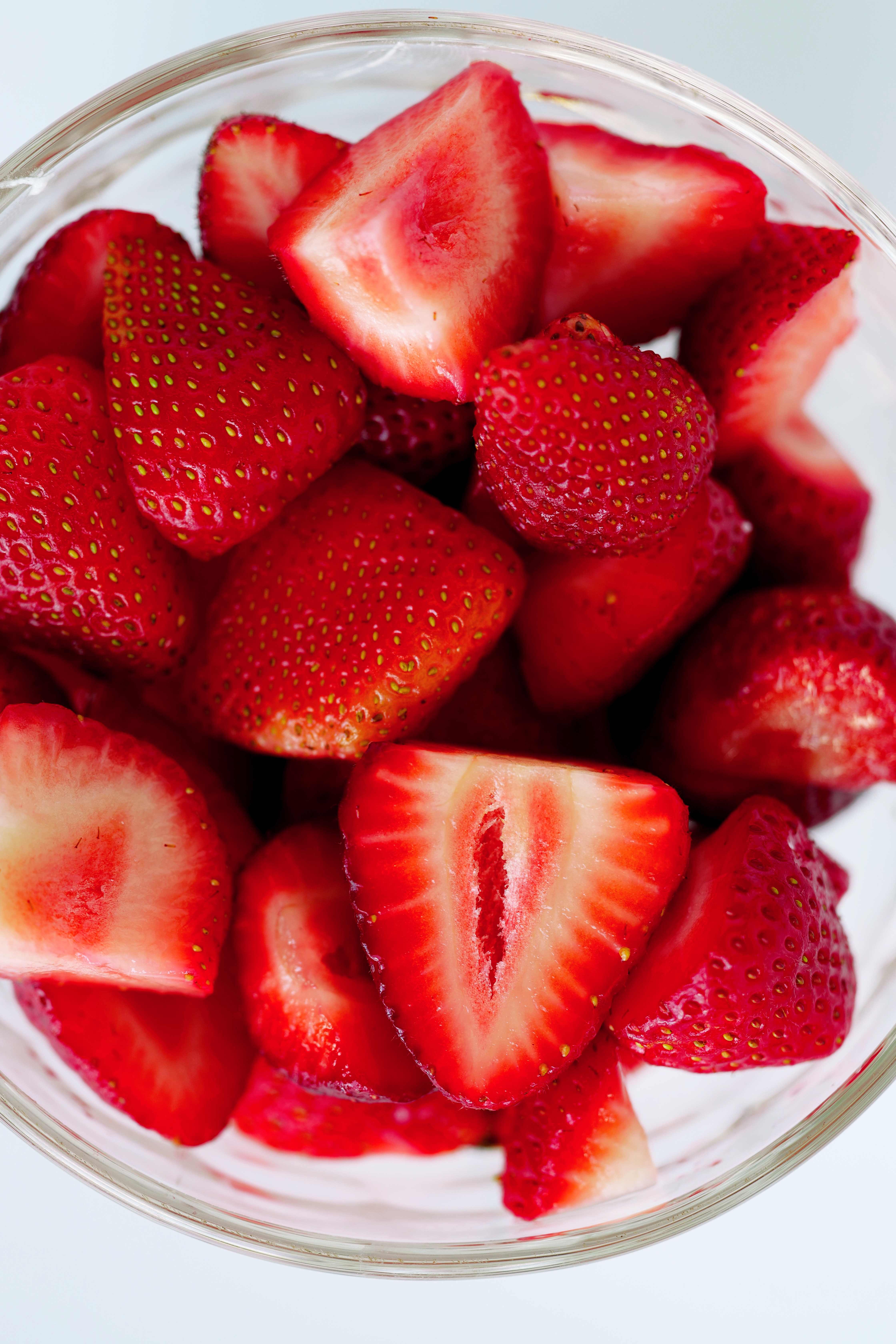 Fresh strawberries cut in half for Strawberries and Cream