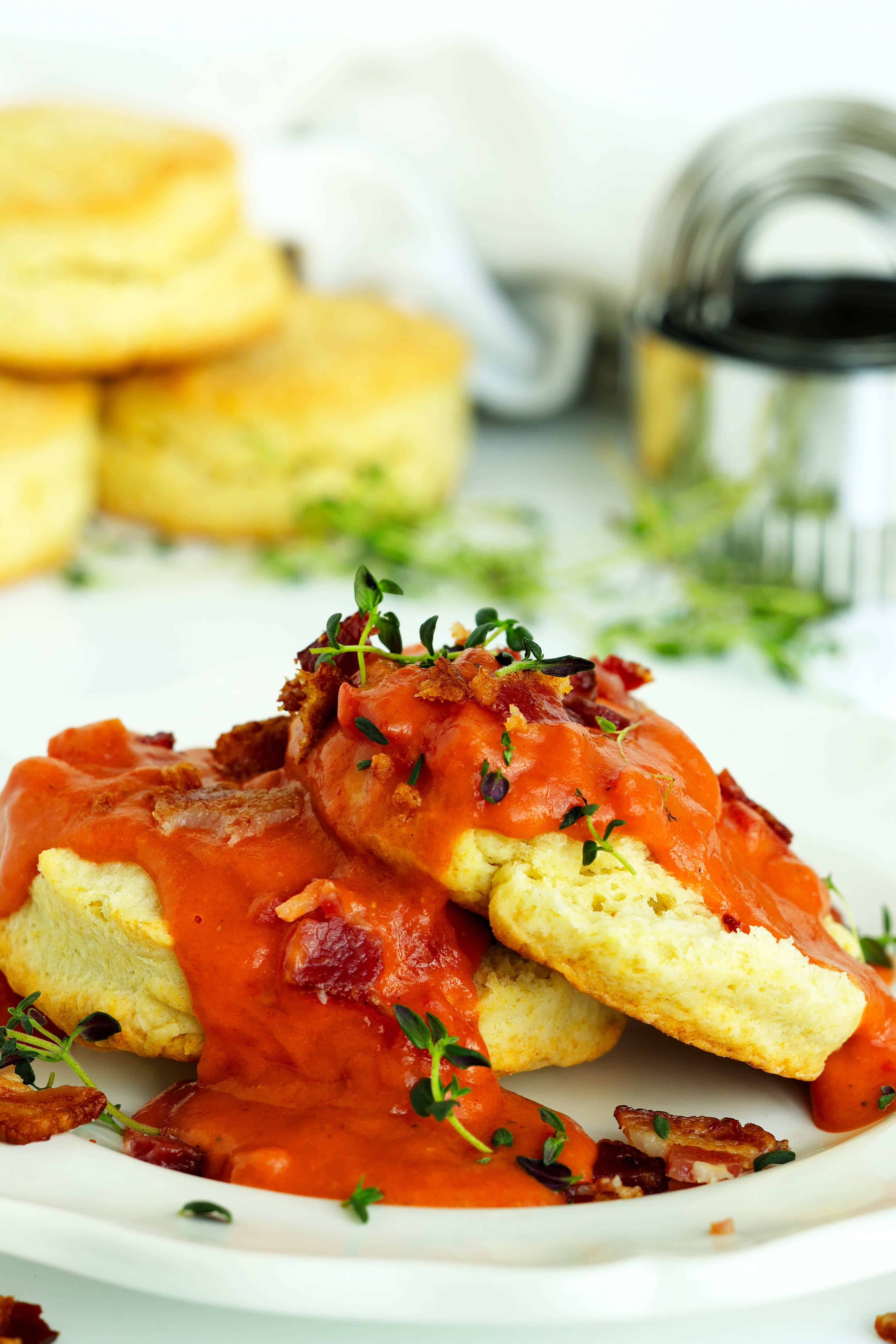 Biscuits topped with Tomato Gravy and bacon