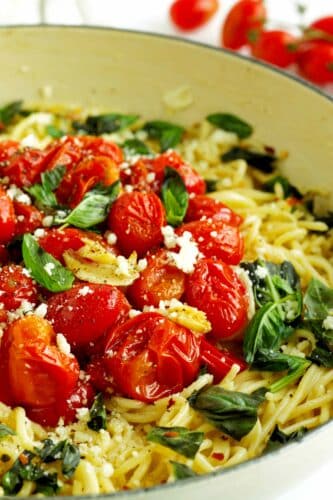 Close-up shot of Chery Tomato Pasta in a Dutch oven