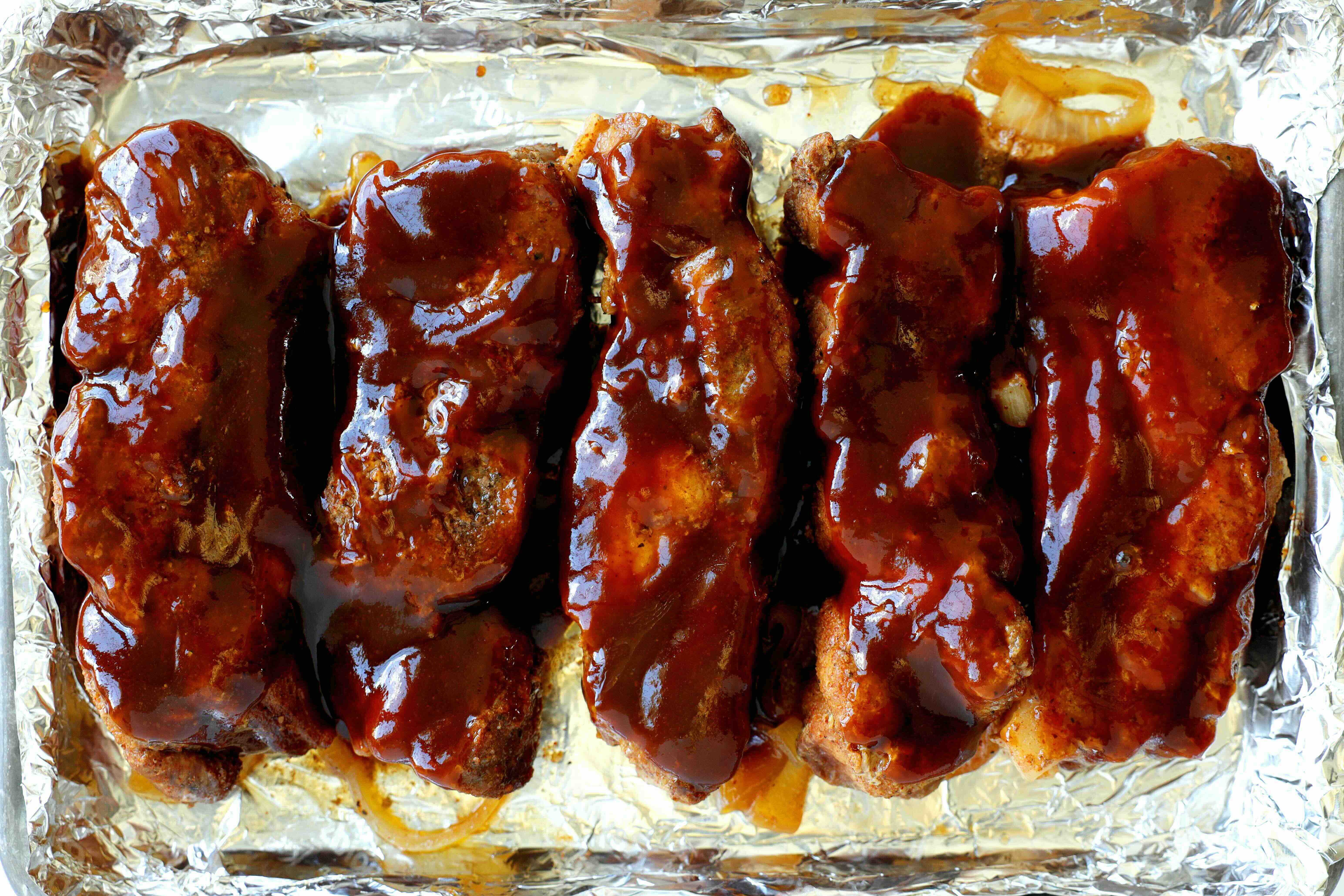 Closeup of Country-Style Pork Ribs on a baking sheet