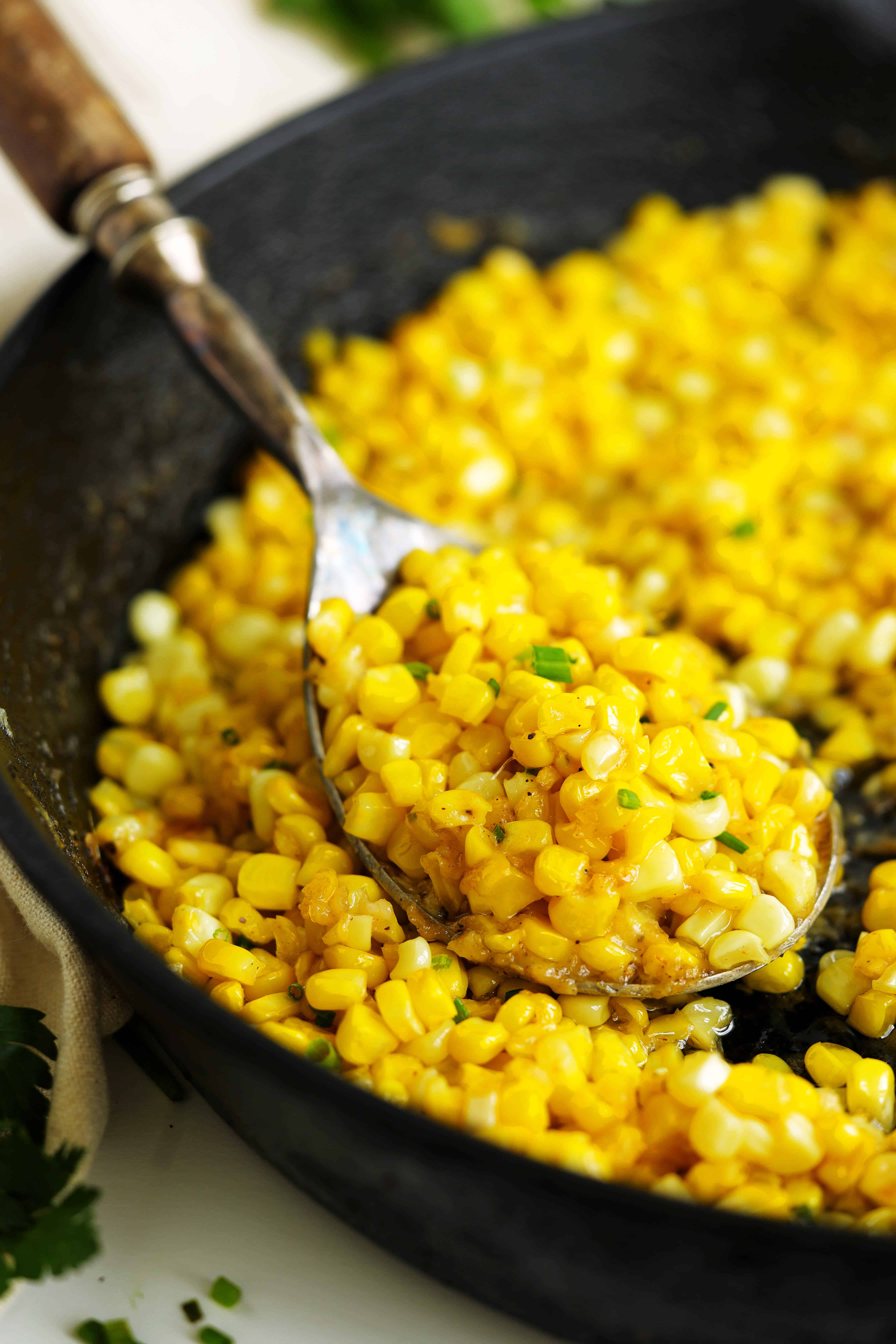 Fried corn in a cast-iron skillet