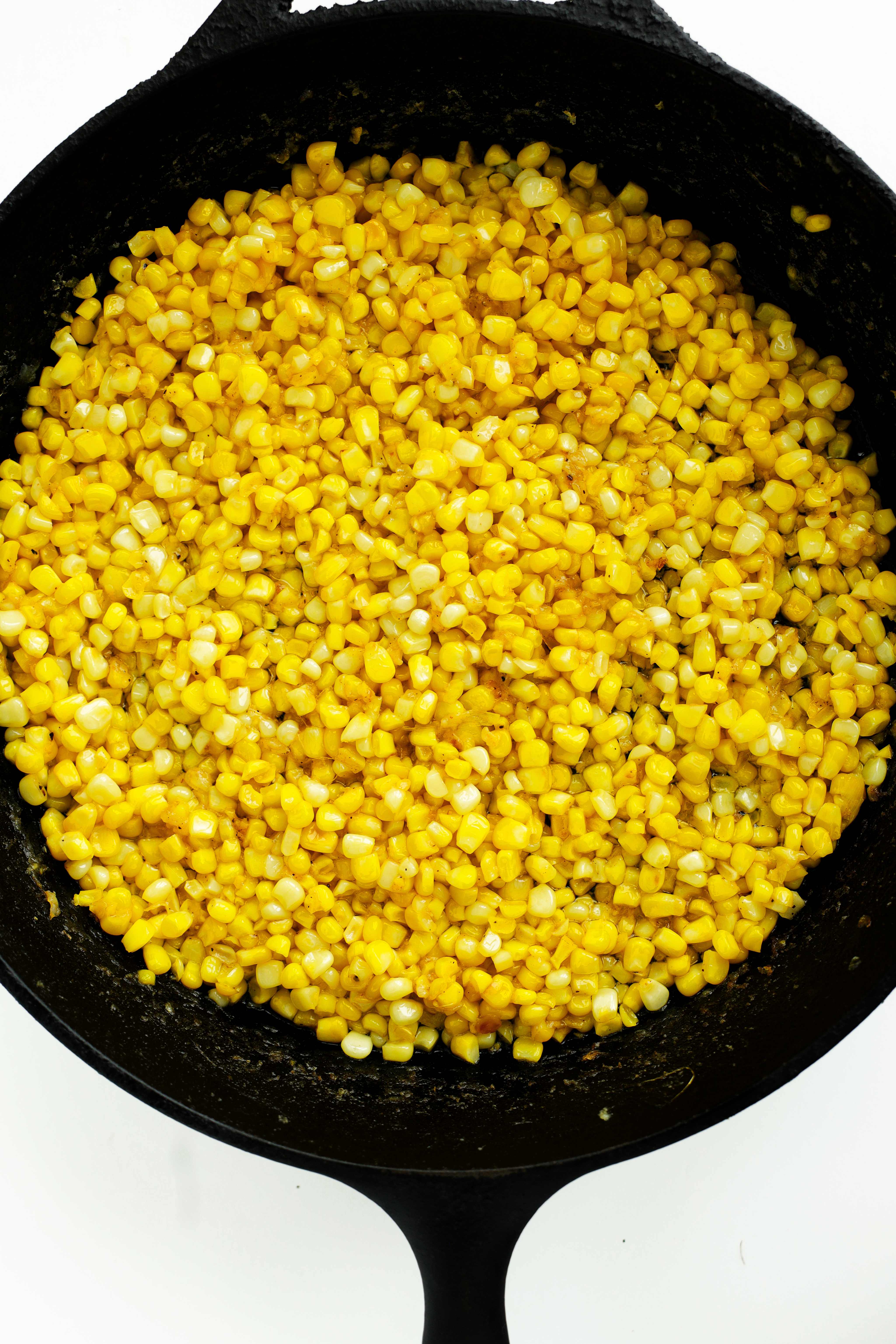 Overhead shot of Fried Corn in a cast-iron skillet