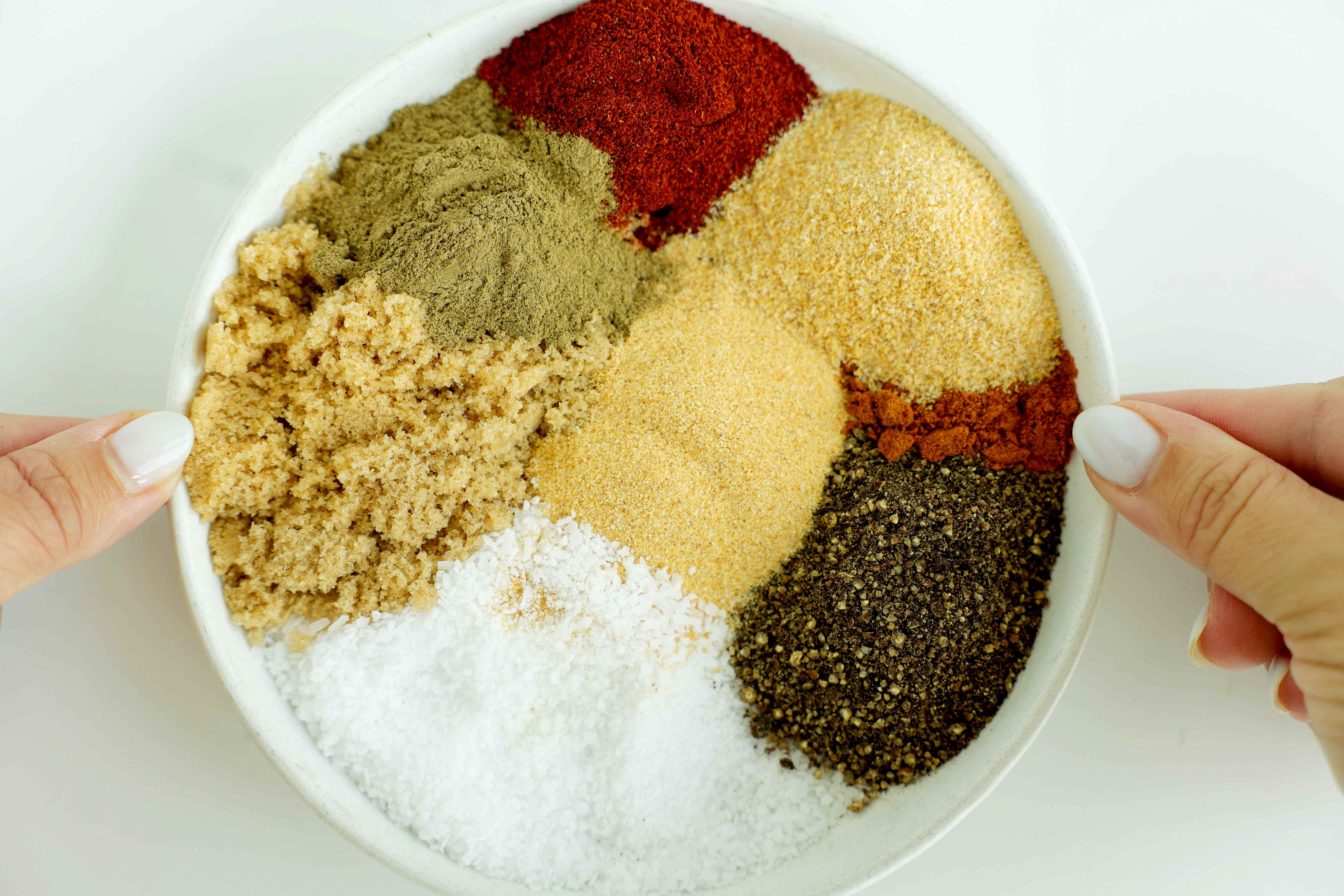 Overhead shot of Pork Chops Seasoning ingredients in a mixing bowl
