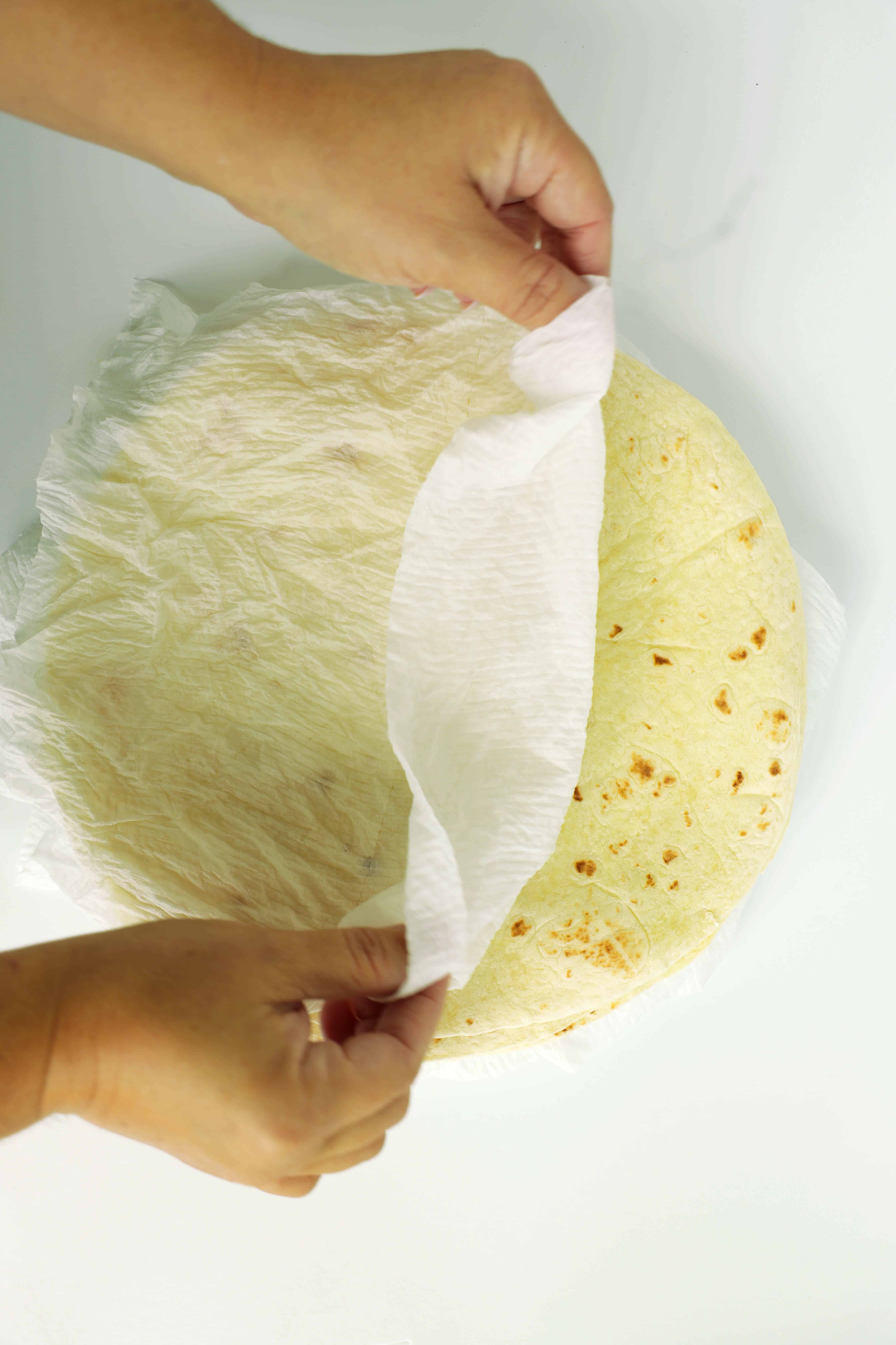 Heating tortillas in damp paper towels in the microwave for Wet Burrito Recipe