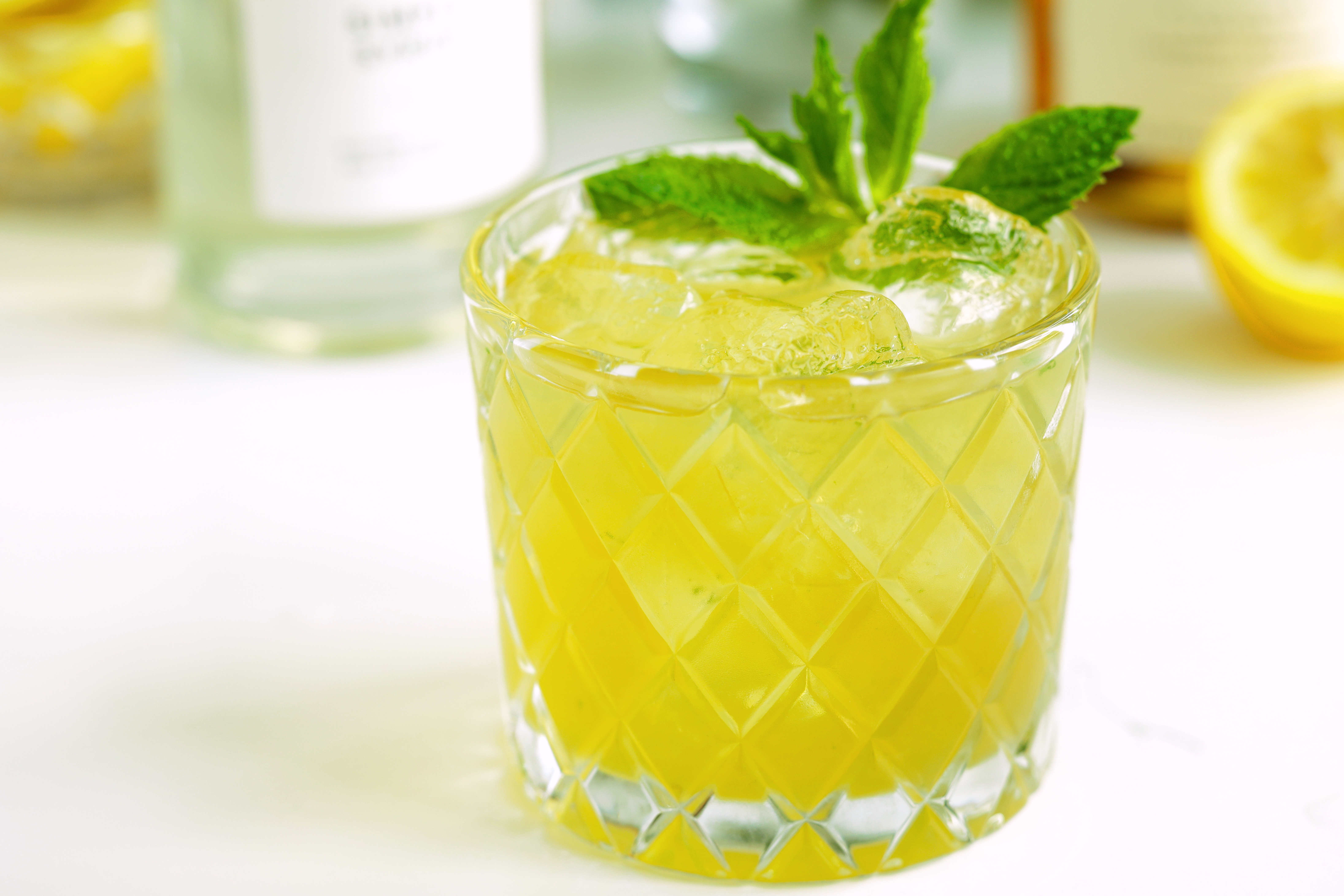 Bourbon Smash in a rock glass with mint