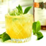 Bourbon Smash in a rock glass with mint