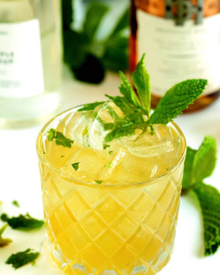 Bourbon Smash in a rock glass with mint