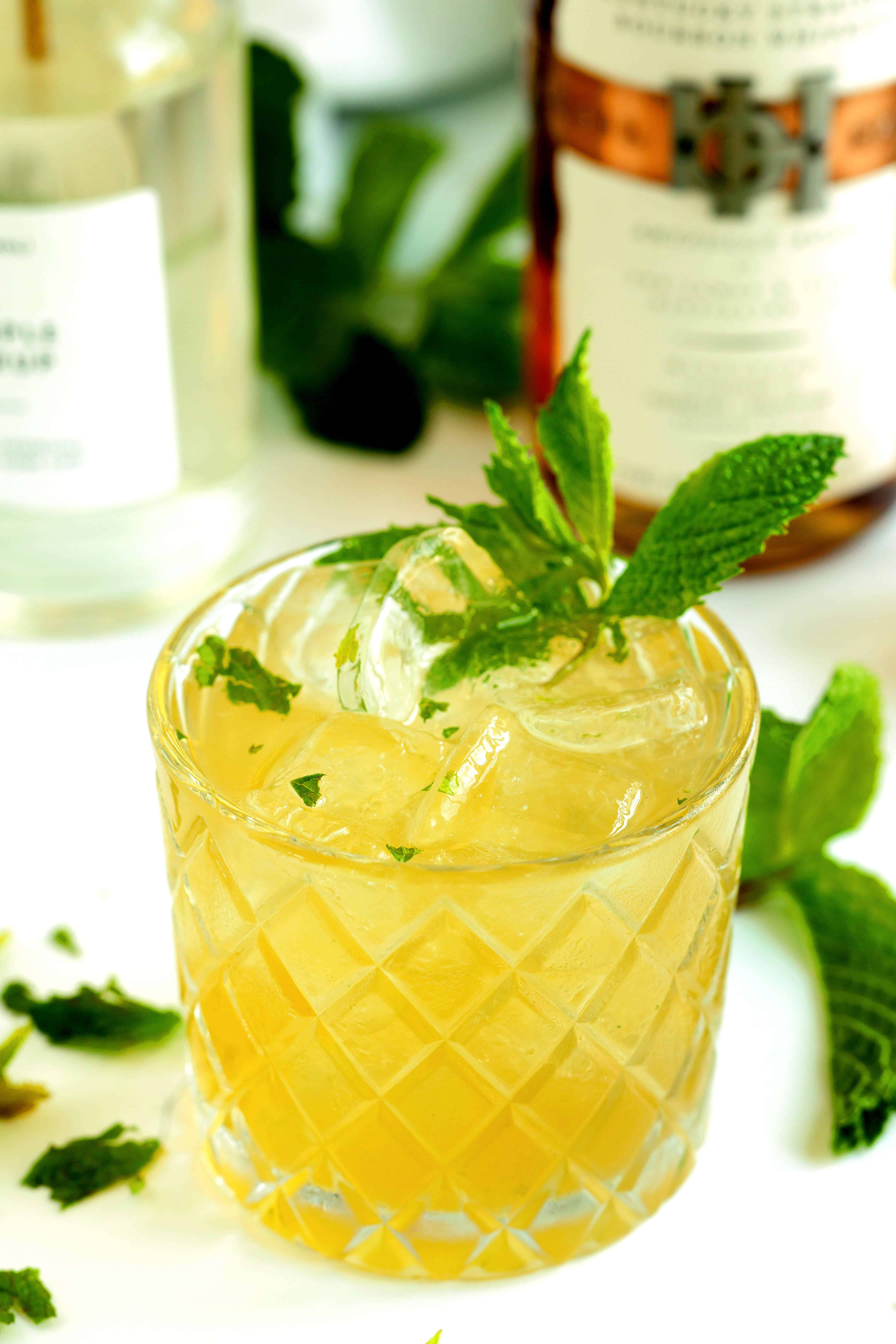 Bourbon Smash in a rock glass with mint