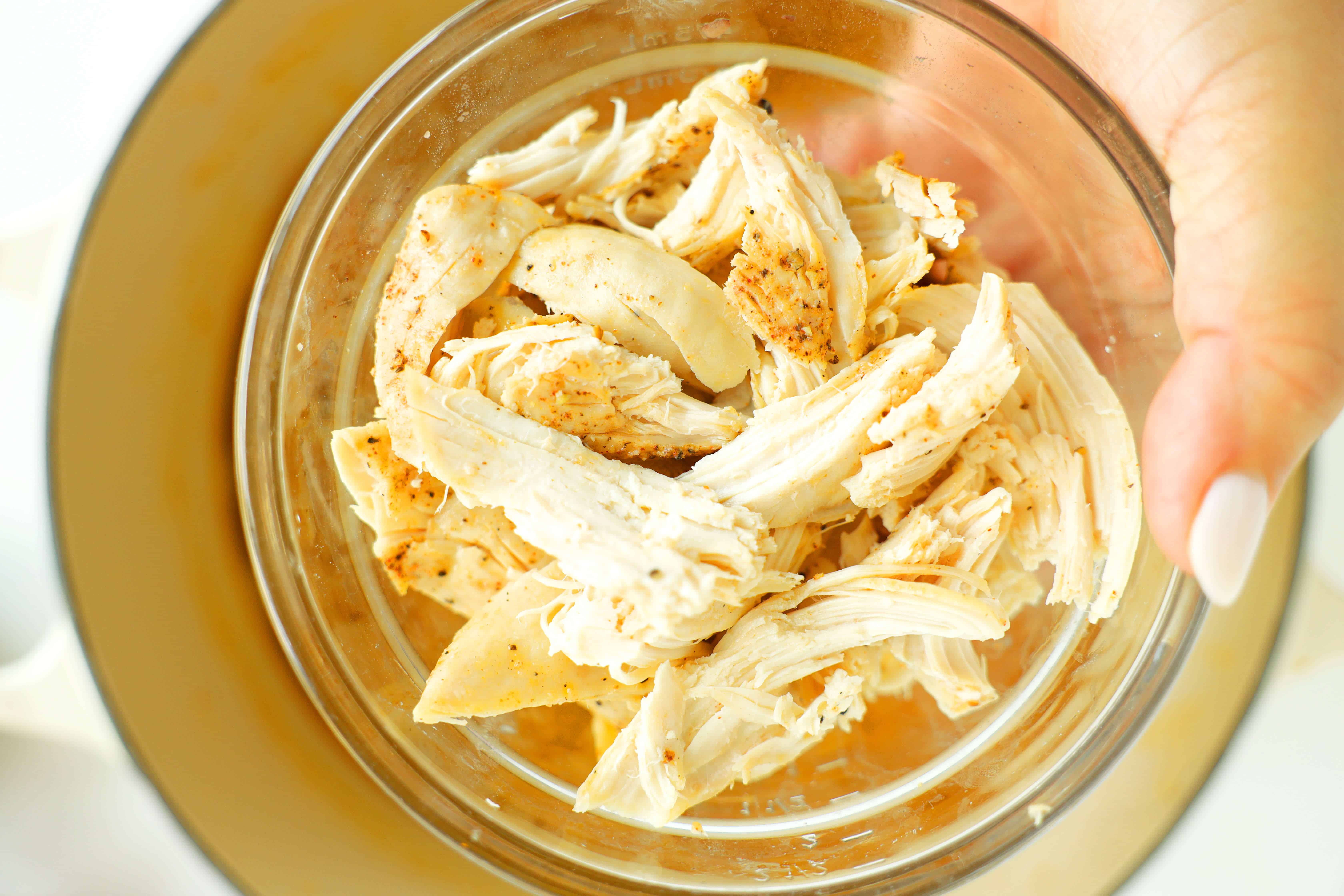 Shredded oven-roasted chicken for Chicken Enchilada Soup