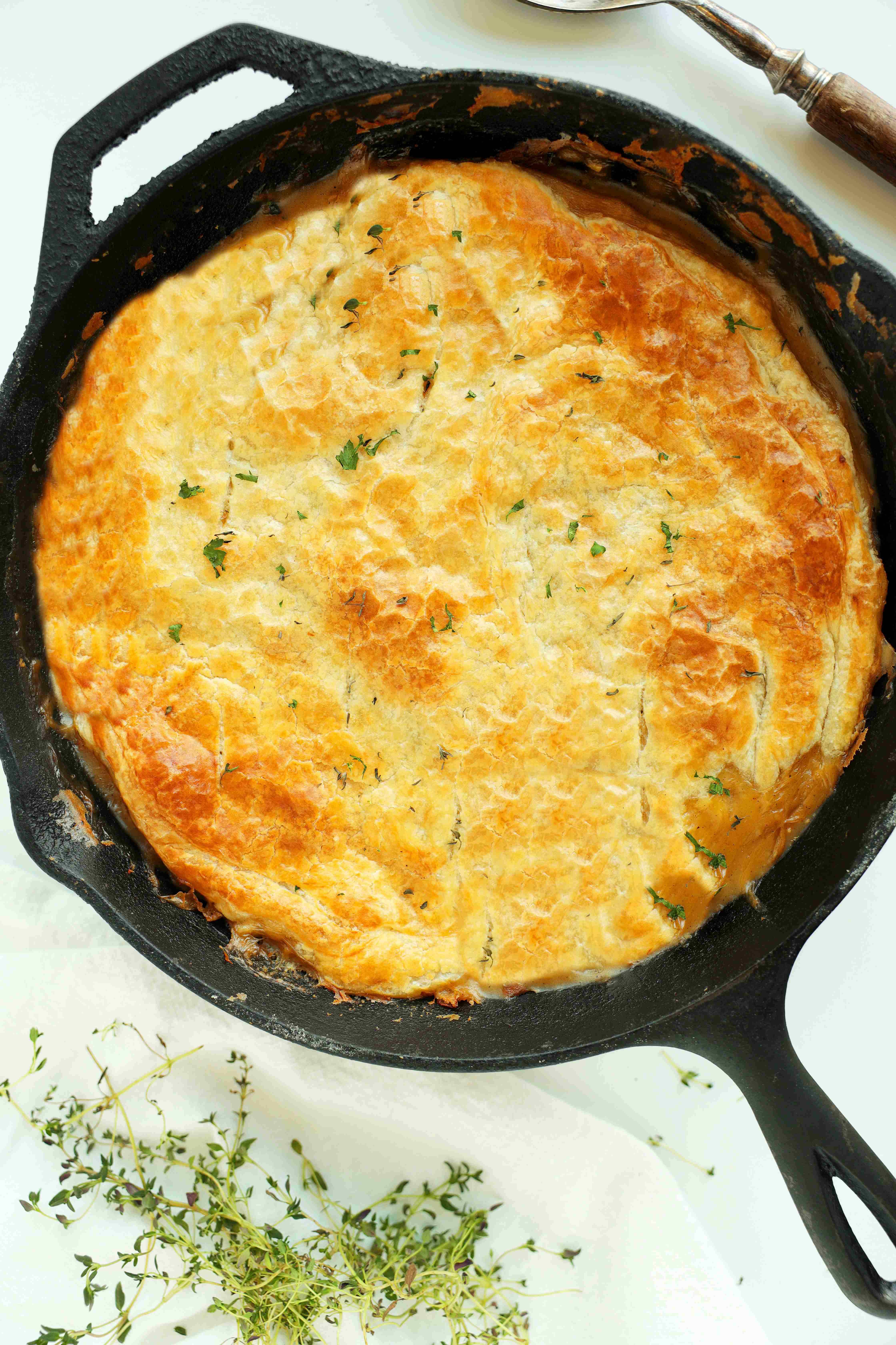 Overhead shot of Chicken Pot Pie with Puff Pastry in a cast iron skillet