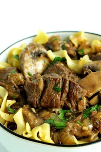 Closeup of crockpot beef tips and gravy