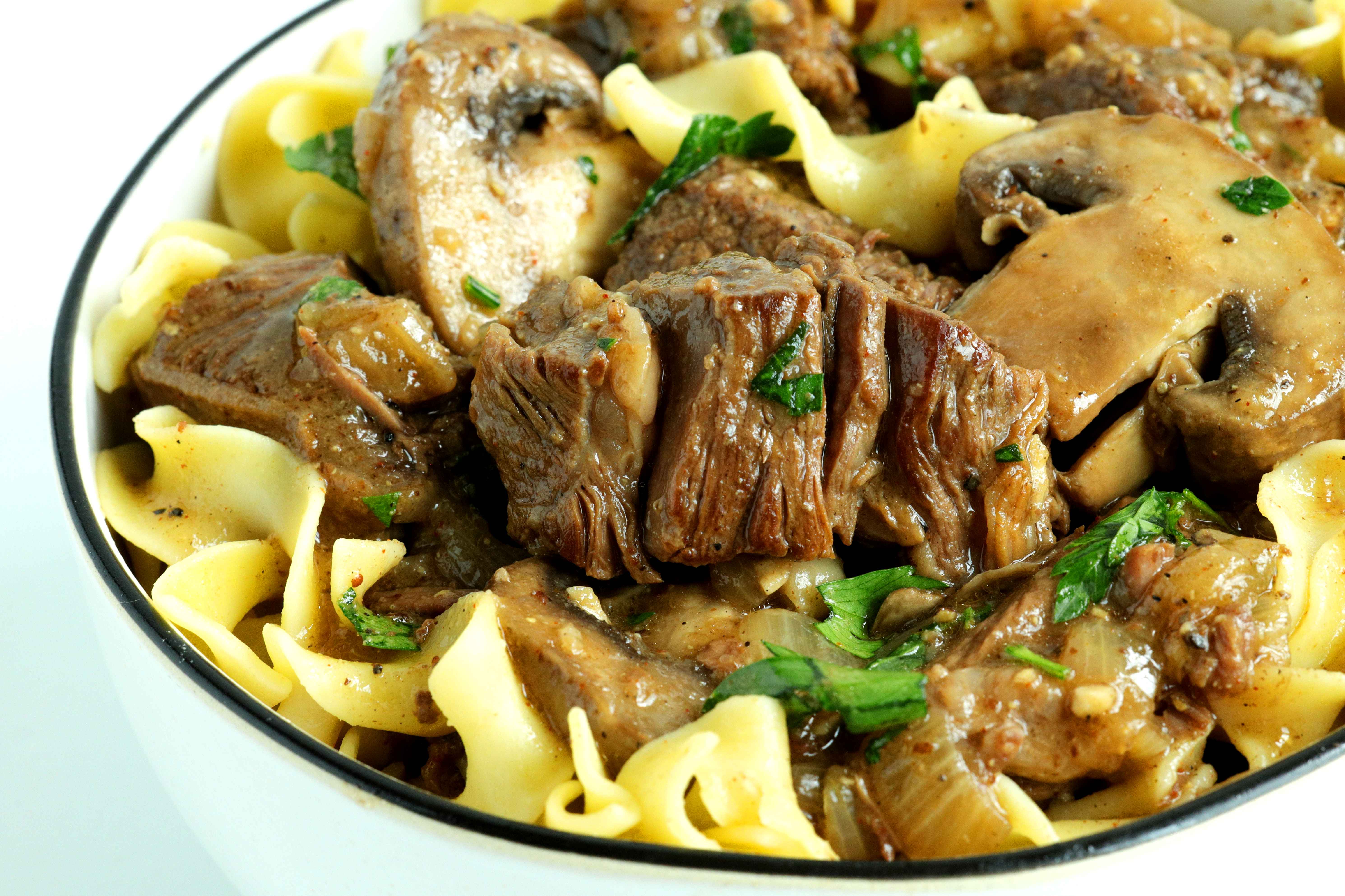 Closeup of crockpot beef tips and gravy