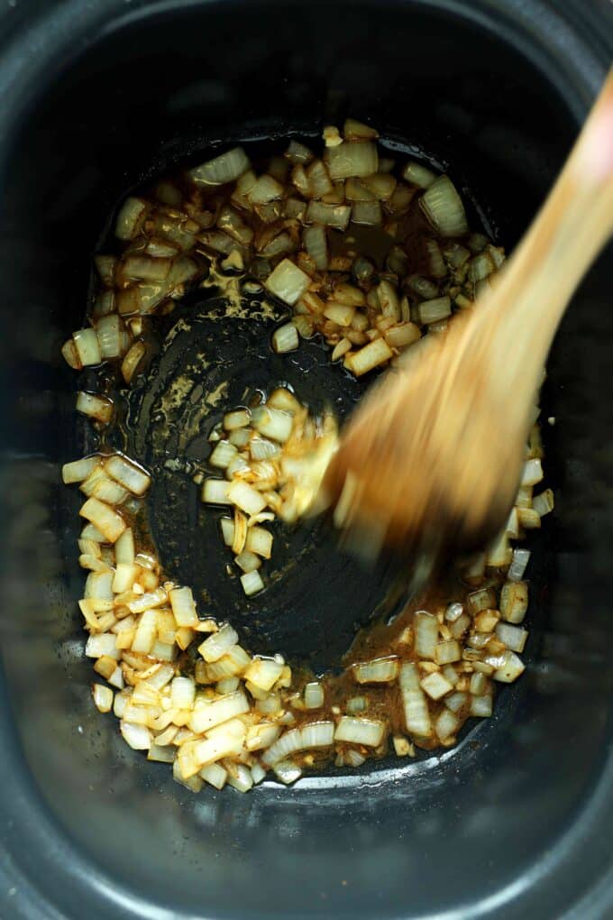 Saut&eacute; onions and garlic for crockpot beef tips with gravy
