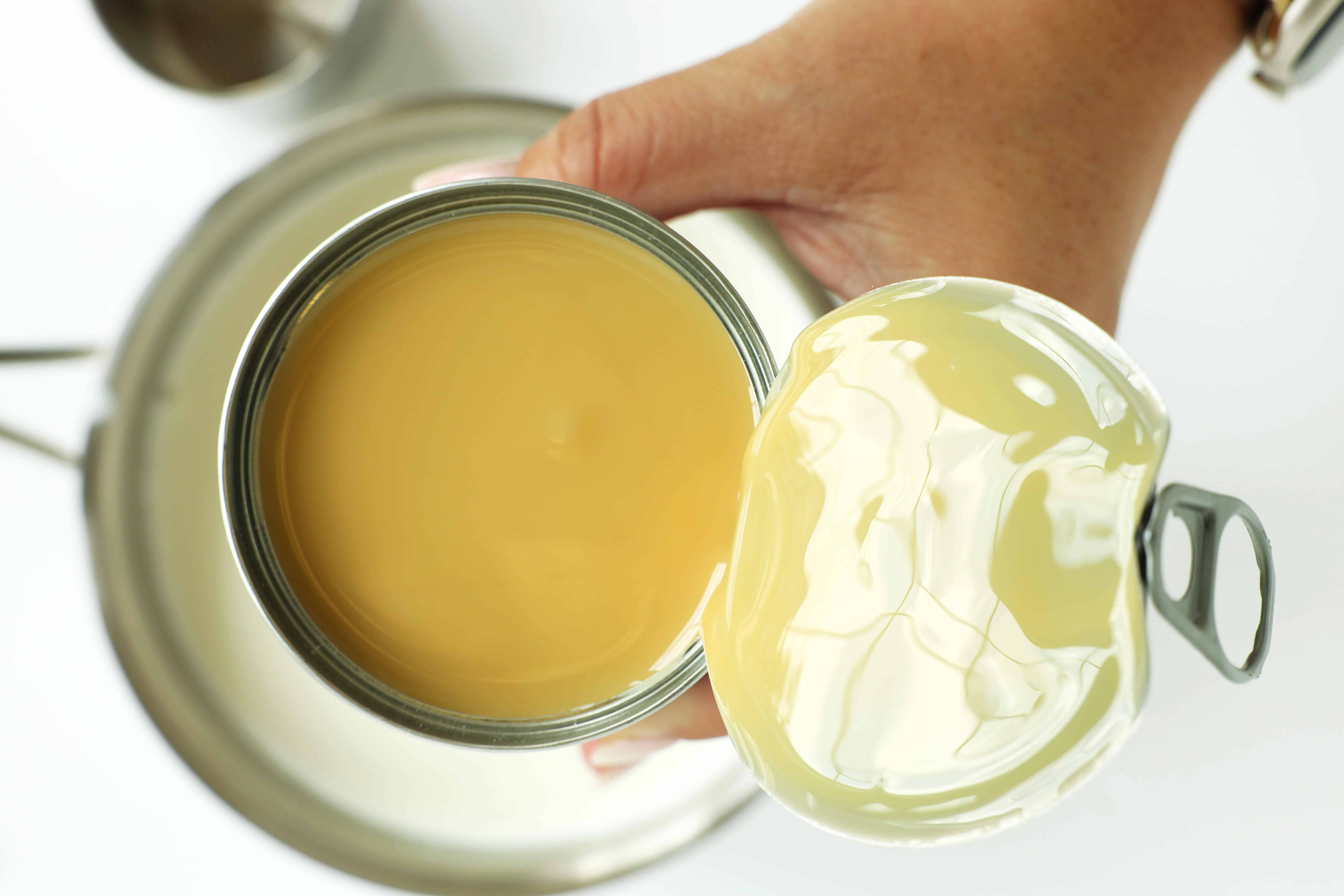 Overhead shot of sweetened condensed milk for white hot chocolate