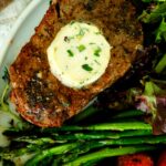 Close-up of perfectly cooked filet mignon with golden sear and tender texture.