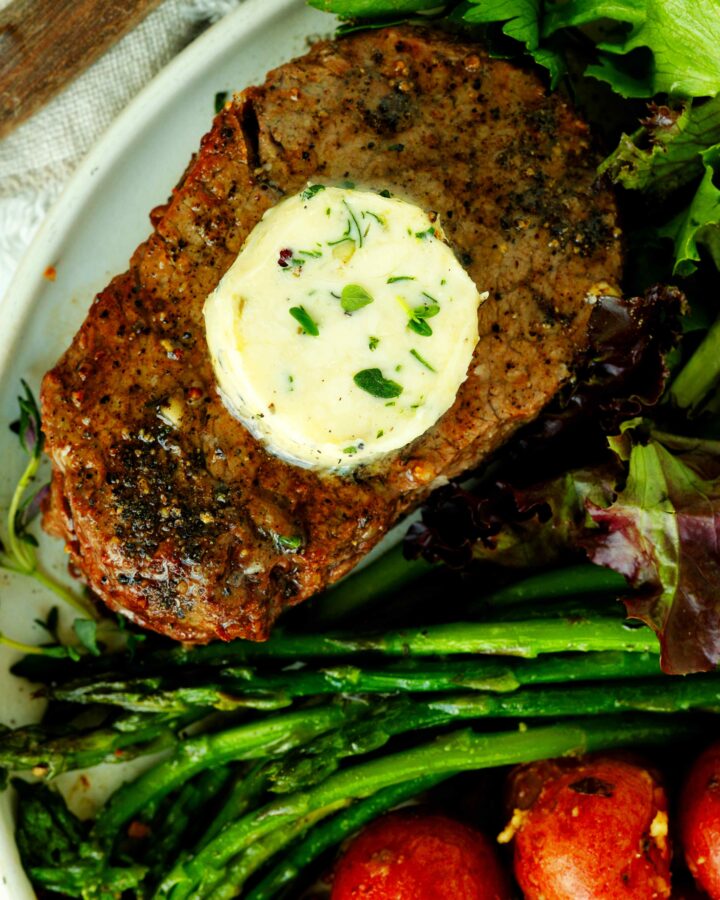 Close-up of perfectly cooked filet mignon with golden sear and tender texture.