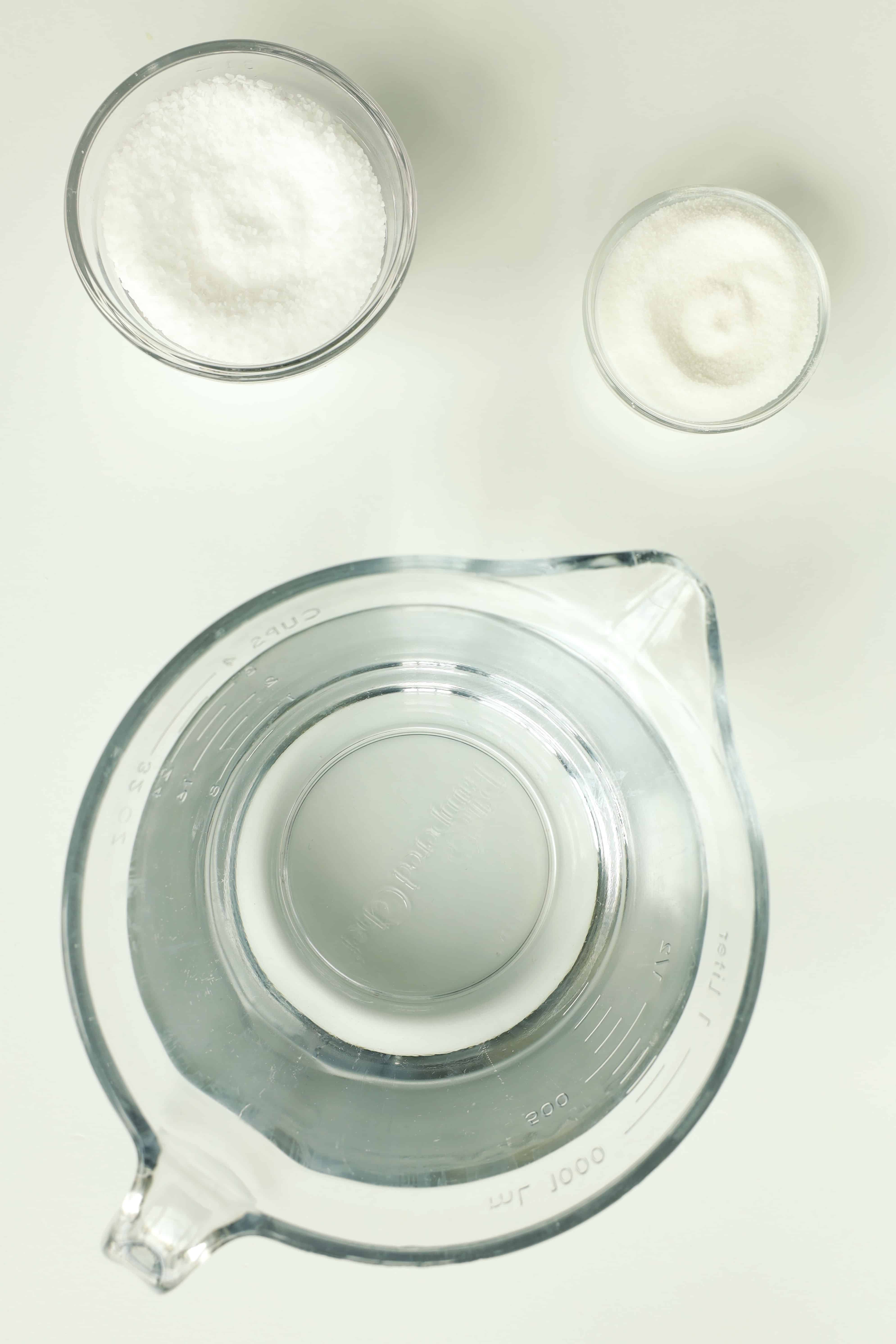 Measured water, kosher salt, and sugar for chicken brine